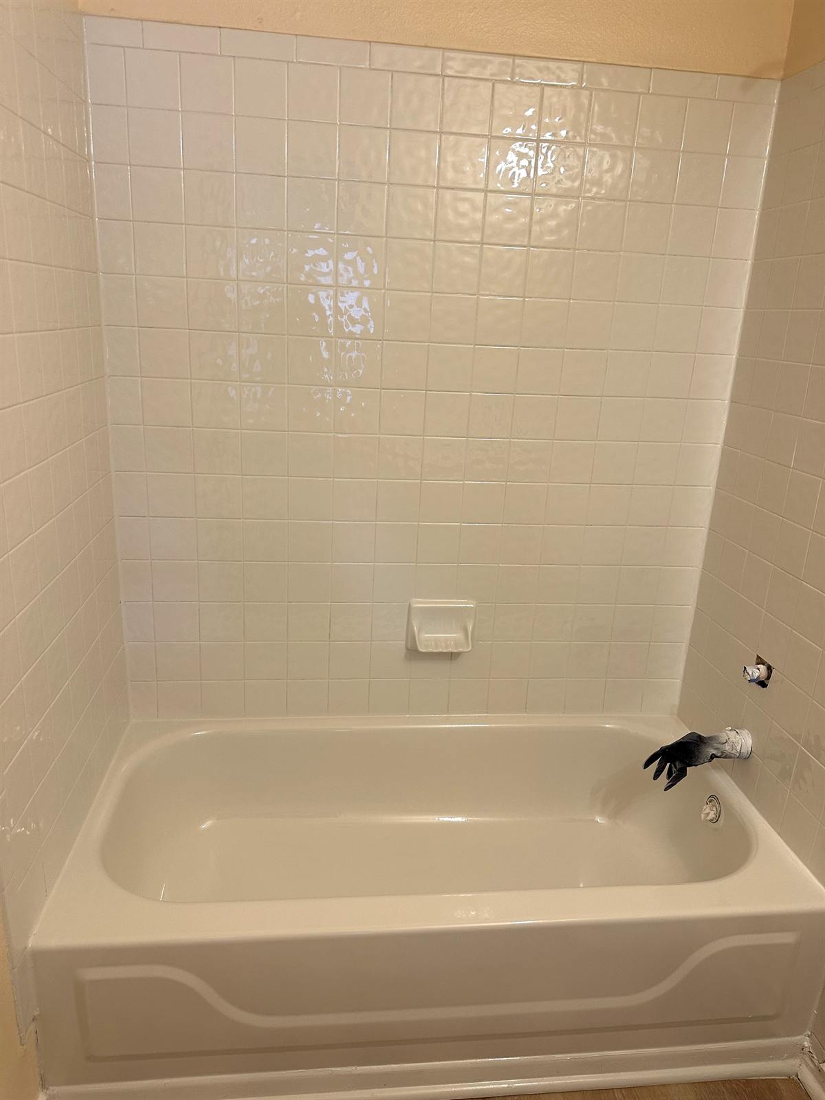 After bathtub and tile resurfacing with smooth bright white finish