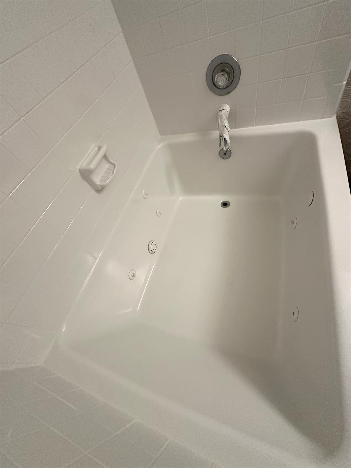 After whirlpool tub refinishing with restored non-slip floor area